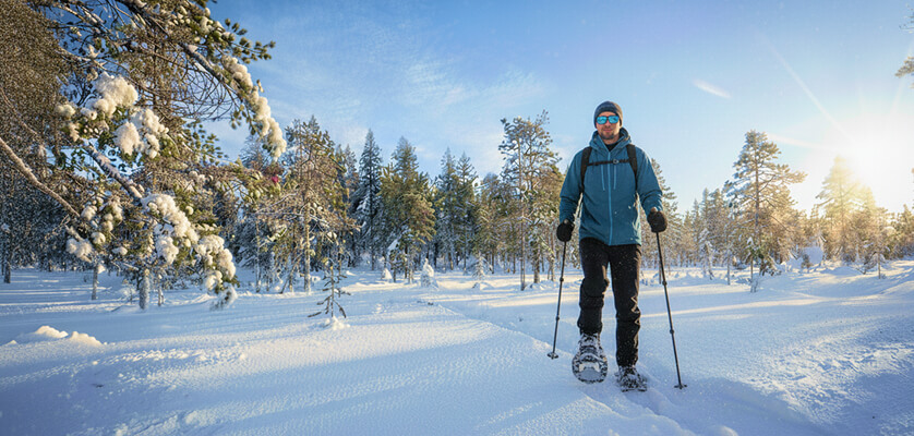 Snowshoeing in Arctic forests